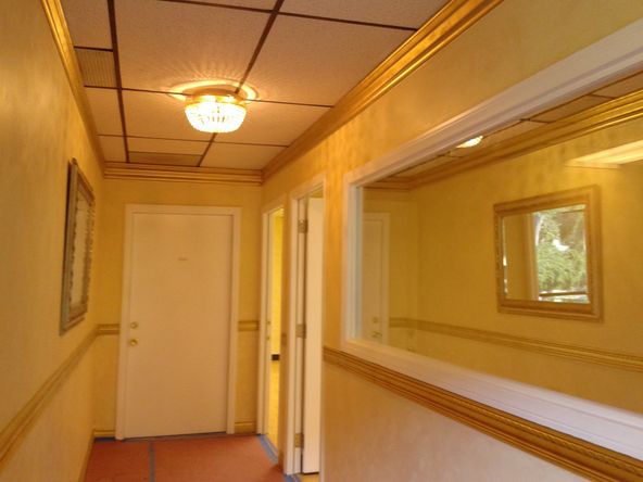 LARGE PRIVATE OFFICE, MULTIPLE USES. WOOD FLOOR.